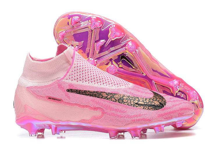 PINK NIKE FOOTBALL BOOTS. side view