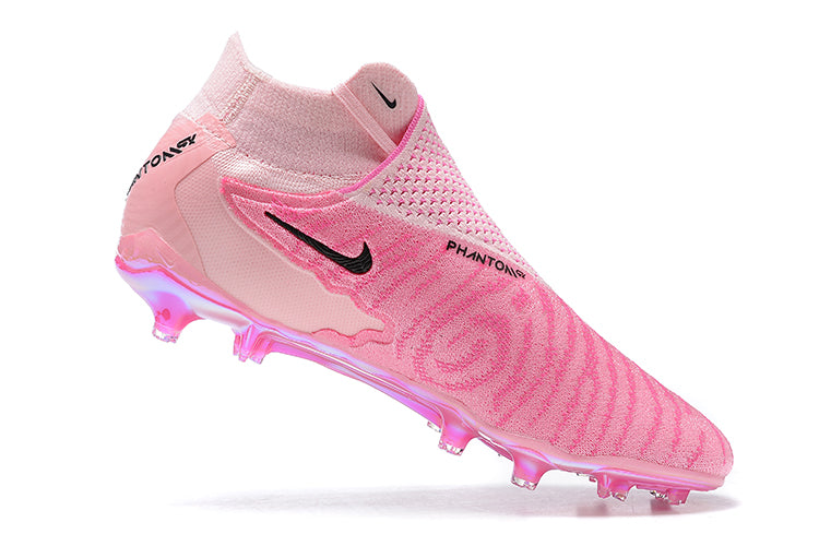 PINK NIKE FOOTBALL BOOTS. STANDING VIEW
