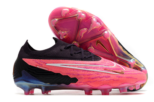 pink and black football boots side view