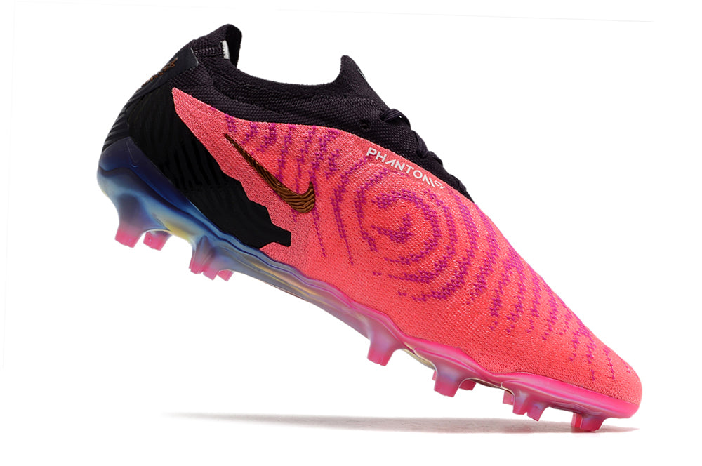 pink and black boots angled view