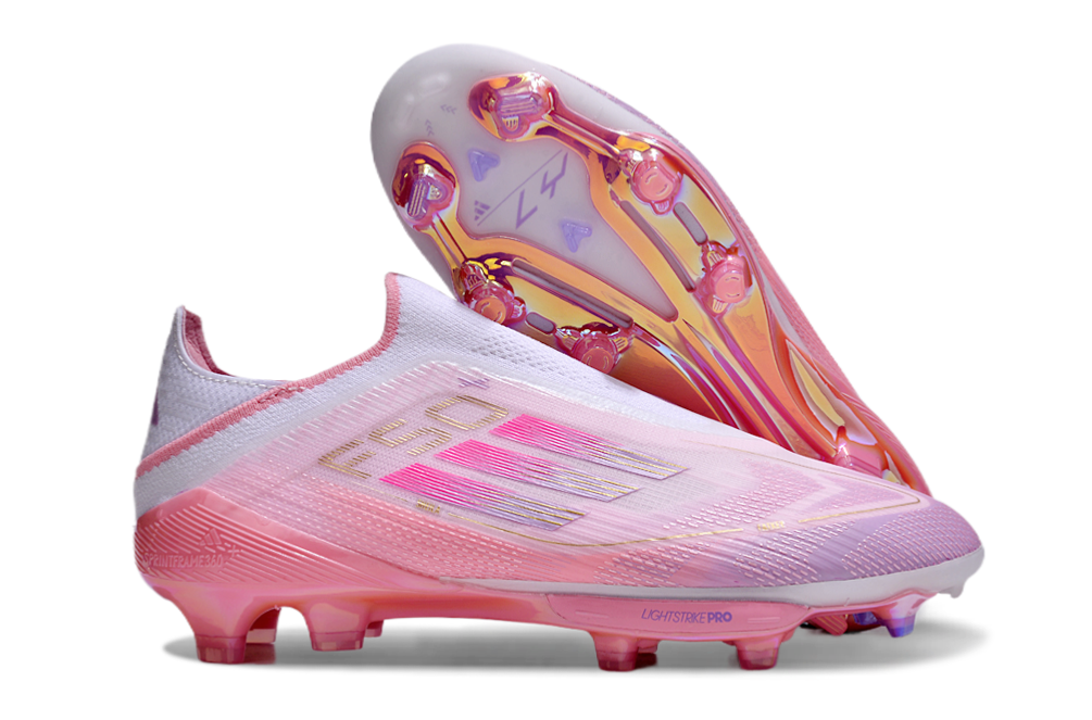 pink adidas football boots side view